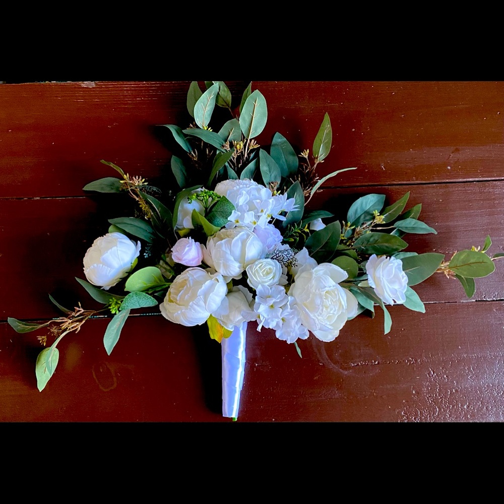White bridal bouquet roses